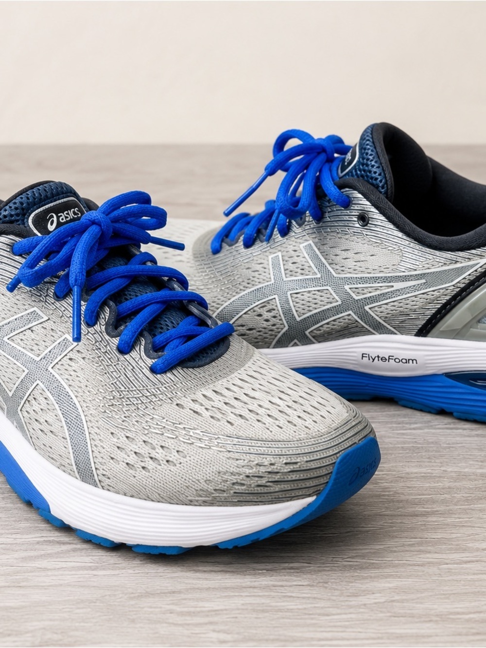 Asics Grey Running Shoes with Bright Blue Accents Size 7